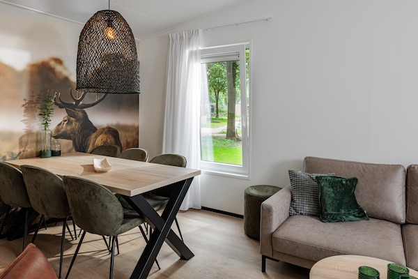 Foto van Lodge in Schaijk met omheinde tuin - Vakantiehuis in Schaijk - LivingRoom