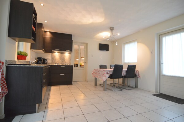 Foto van Comfort en ontspanning in dit charmante herenhuis. - Kitchen