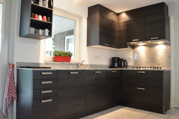 Foto van Comfort en ontspanning in dit charmante herenhuis. - Kitchen