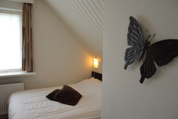 Foto van Comfort en ontspanning in dit charmante herenhuis. - BedRoom