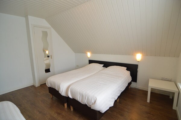 Foto van Comfort en ontspanning in dit charmante herenhuis. - BedRoom