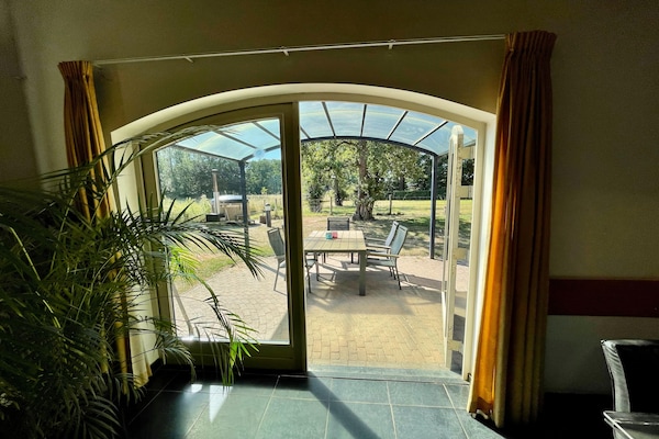Foto van Koetshuis bij Roermond met tuin - Vakantiehuis in Sint Odilienberg - ViewSummer