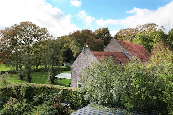 Foto van Koetshuis bij Roermond met tuin - Vakantiehuis in Sint Odilienberg - ExteriorSummer