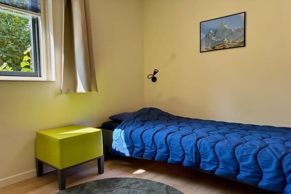 Foto van Bosretraite met zonneoplader - Vakantiehuis in Ewijk - BedRoom