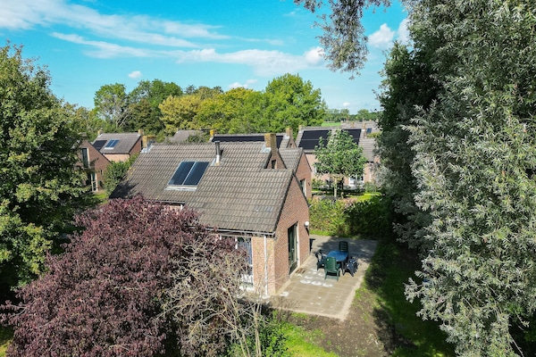 Foto van Bosbungalow voor 5 gasten in Ewijk - Vakantiehuis in Ewijk - ExteriorSummer