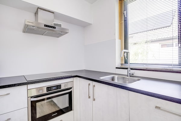 Foto van Bosbungalow voor 5 gasten in Ewijk - Vakantiehuis in Ewijk - Kitchen
