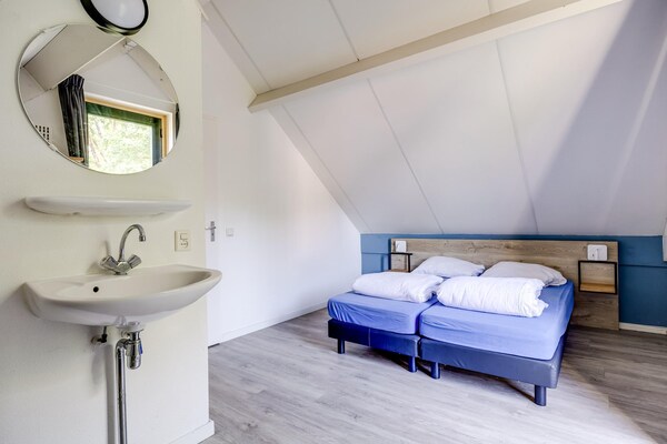 Foto van Bosbungalow voor 5 gasten in Ewijk - Vakantiehuis in Ewijk - BedRoom