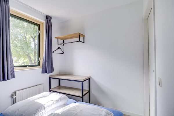 Foto van Bosbungalow voor 5 gasten in Ewijk - Vakantiehuis in Ewijk - BedRoom