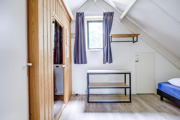 Foto van Bosbungalow voor 5 gasten in Ewijk - Vakantiehuis in Ewijk - BedRoom