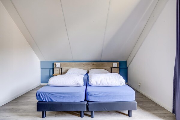 Foto van Bosbungalow voor 5 gasten in Ewijk - Vakantiehuis in Ewijk - BedRoom