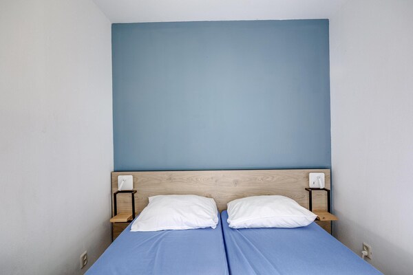 Foto van Bosbungalow voor 5 gasten in Ewijk - Vakantiehuis in Ewijk - BedRoom