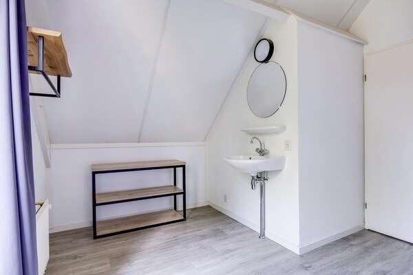 Foto van Bosbungalow voor 5 gasten in Ewijk - Vakantiehuis in Ewijk - BathRoom