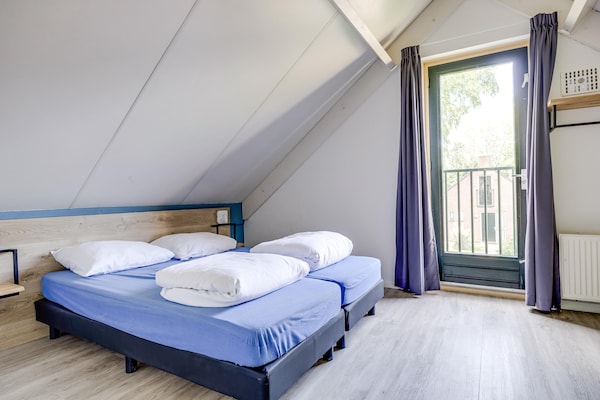 Foto van Bosbungalow voor 5 gasten in Ewijk - Vakantiehuis in Ewijk - BedRoom