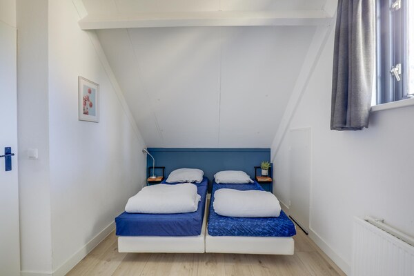 Foto van Bungalow aan het meer met tuin, geschikt voor 6 - Vakantiehuis in Ewijk - BedRoom