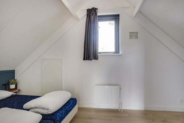 Foto van Bungalow aan het meer met tuin, geschikt voor 6 - Vakantiehuis in Ewijk - BedRoom