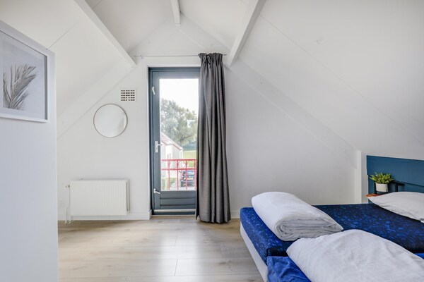 Foto van Bungalow aan het meer met tuin, geschikt voor 6 - Vakantiehuis in Ewijk - BedRoom