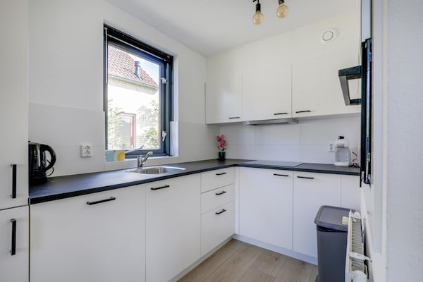 Foto van Bungalow aan het meer met tuin, geschikt voor 6 - Vakantiehuis in Ewijk - Kitchen