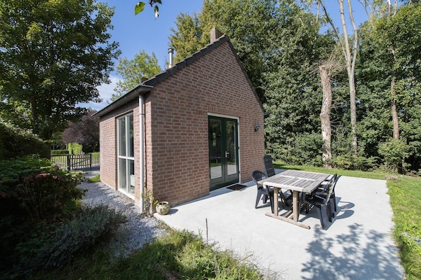 Foto van Bungalow in het bos voor 4 personen - Vakantiehuis in Ewijk - ExteriorSummer