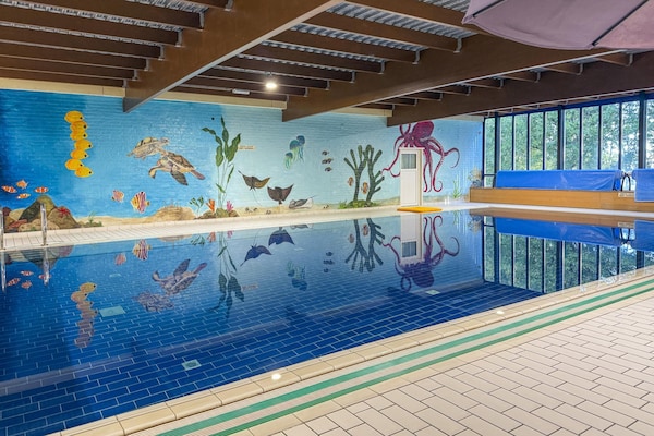 Foto van Bungalow in het bos voor 4 personen - Vakantiehuis in Ewijk - PoolOfHouse