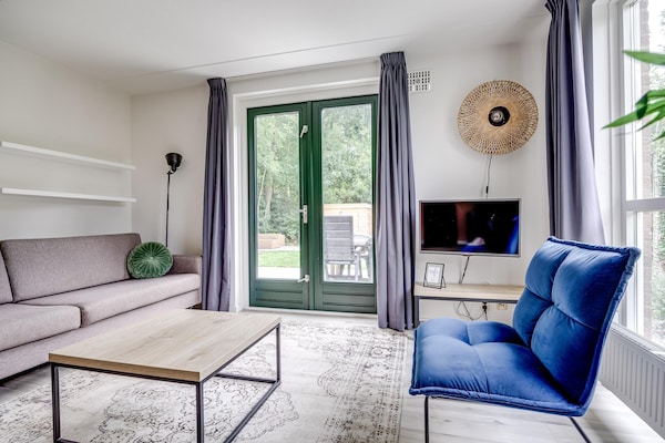 Foto van Bungalow in het bos voor 4 personen - Vakantiehuis in Ewijk - LivingRoom