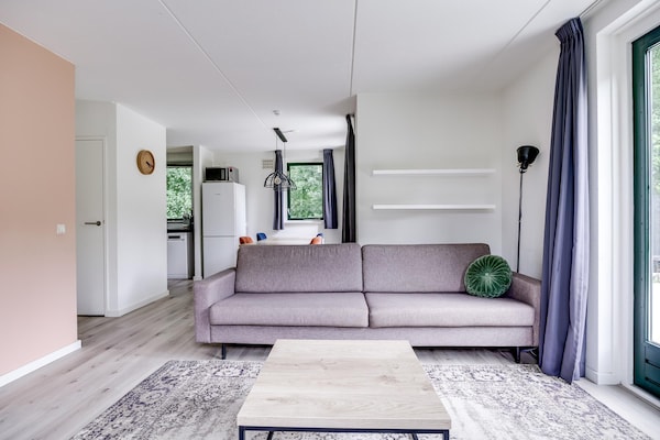 Foto van Bungalow in het bos voor 4 personen - Vakantiehuis in Ewijk - LivingRoom