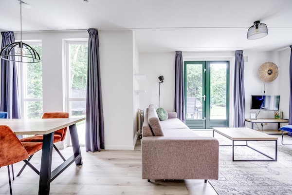 Foto van Bungalow in het bos voor 4 personen - Vakantiehuis in Ewijk - LivingRoom