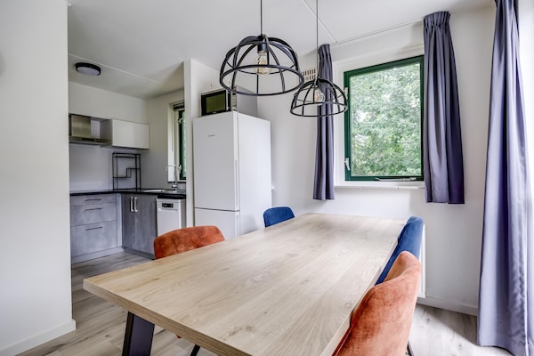 Foto van Bungalow in het bos voor 4 personen - Vakantiehuis in Ewijk - DiningRoom