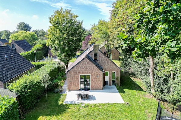 Foto van Bungalow in het bos voor 4 personen - Vakantiehuis in Ewijk - ExteriorSummer