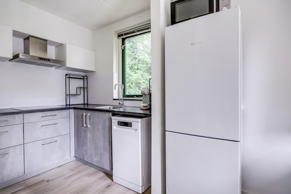 Foto van Bungalow in het bos voor 4 personen - Vakantiehuis in Ewijk - Kitchen