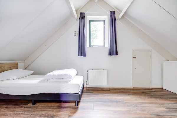 Foto van Bungalow in het bos voor 4 personen - Vakantiehuis in Ewijk - BedRoom