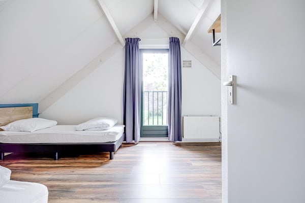 Foto van Bungalow in het bos voor 4 personen - Vakantiehuis in Ewijk - BedRoom