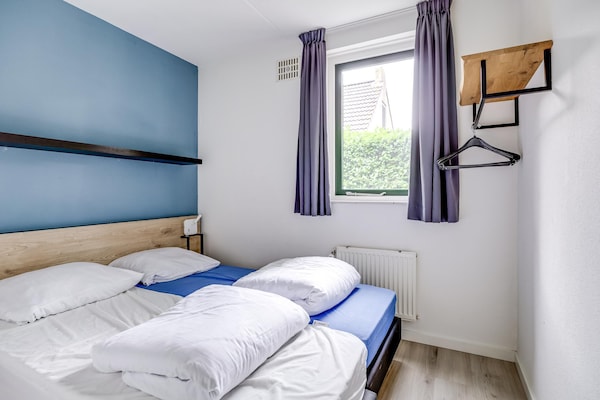 Foto van Bungalow in het bos voor 4 personen - Vakantiehuis in Ewijk - BedRoom
