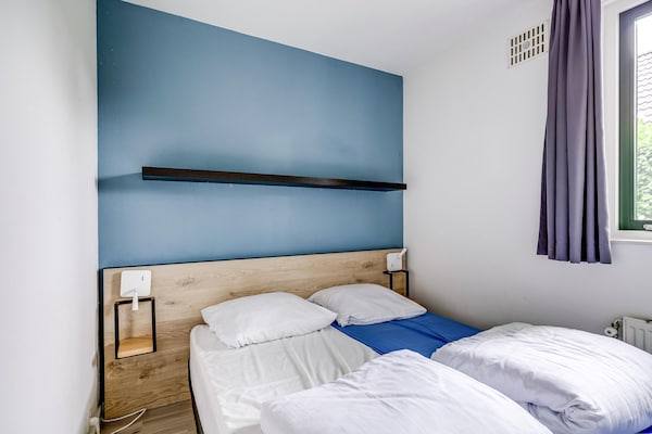Foto van Bungalow in het bos voor 4 personen - Vakantiehuis in Ewijk - BedRoom