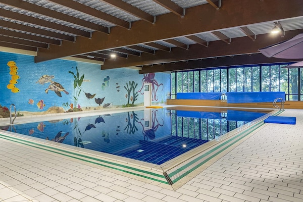 Foto van Bungalow in het bos voor 4 personen - Vakantiehuis in Ewijk - PoolOfHouse
