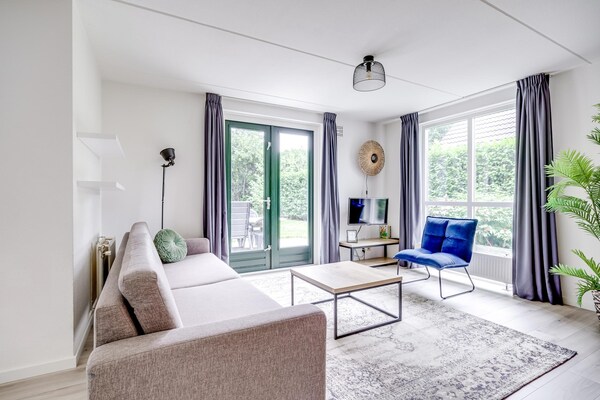Foto van Bungalow in het bos voor 4 personen - Vakantiehuis in Ewijk - LivingRoom