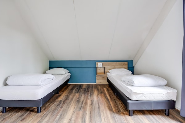 Foto van Bungalow in het bos voor 4 personen - Vakantiehuis in Ewijk - BedRoom
