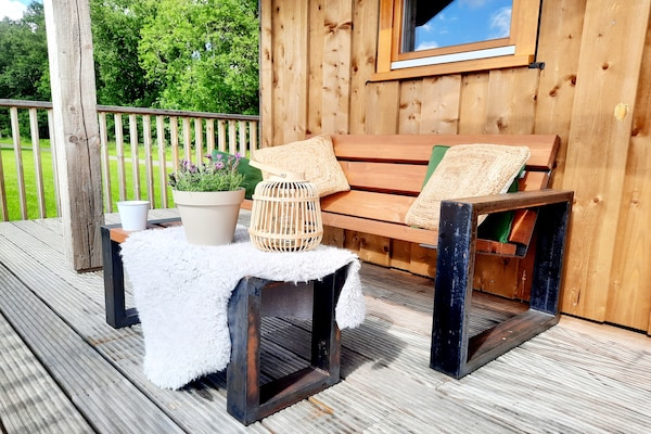 Foto van Lodge aan de Weiden met Mooie Veranda - Vakantiehuis in Ruinerwold - TerraceBalcony