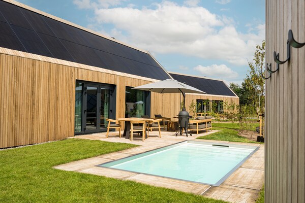 Foto van Vakantiehuis in Drenthe met privézwembad - Vakantiehuis in Appelscha - ExteriorSummer