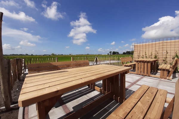 Foto van Twee naast elkaar gelegen luxe villa's in Friesland - TerraceBalcony