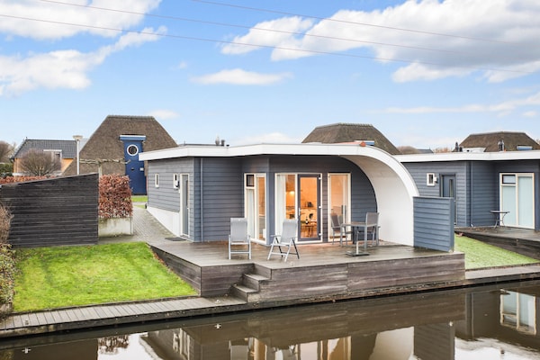 Foto van Bungalow aan het meer met sauna - Vakantiehuis in Midlaren - ExteriorSummer