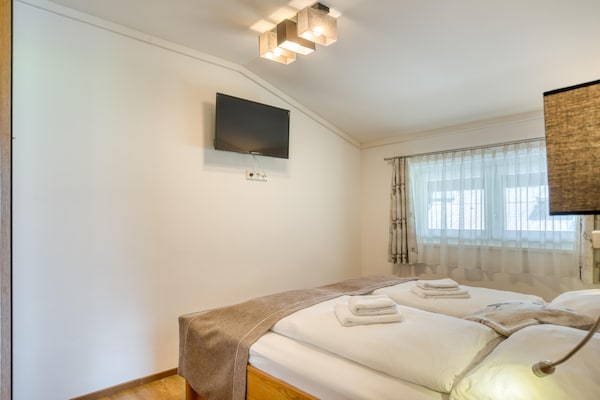Foto van Chalet in Neukirchen met Bergzicht - Vakantiehuis in Neukirchen - BedRoom