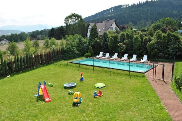 Foto van Villa in Brenna bij Skiliften & Zwembad - Vakantiehuis in Brenna - GardenSummer