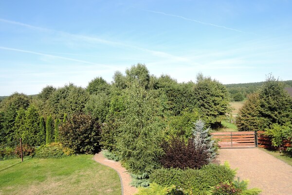 Foto van Houten Huis Kolczewo bij Oostzeestrand - Vakantiehuis in Kolczewo - GardenSummer