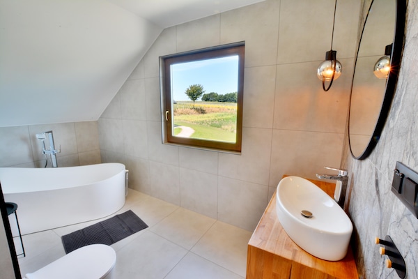 Foto van Comfortabel vakantiehuis, sauna + hottub - Vakantiehuis in Sulechowo - LivingRoom