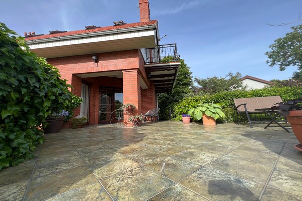 Foto van Vakantiehuis in Ustronie Morskie bij Strand - Vakantiehuis in Ustronie Morskie - TerraceBalcony