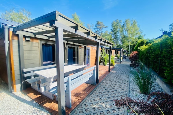 Foto van Vakantiehuis in Dziwnów bij de Oostzee - Vakantiehuis in Dziwnow - ExteriorSummer