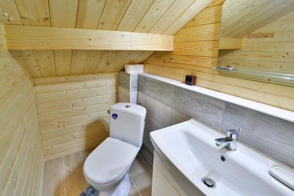 Foto van Houten Huis bij Ostrowieckie Meer met Strand - Vakantiehuis in Ostrowiec - BathRoom