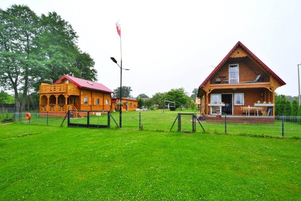 Foto van Houten Huis bij Ostrowieckie Meer met Strand - Vakantiehuis in Ostrowiec - GardenSummer