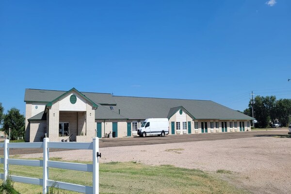 Foto van 2 Queensize bedden | Niet roken - Vakantiehuis in Texhoma, OK - ExteriorSummer